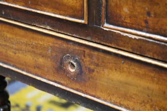 A Regency mahogany washstand with cistern compartment and basin recess W.94cm.